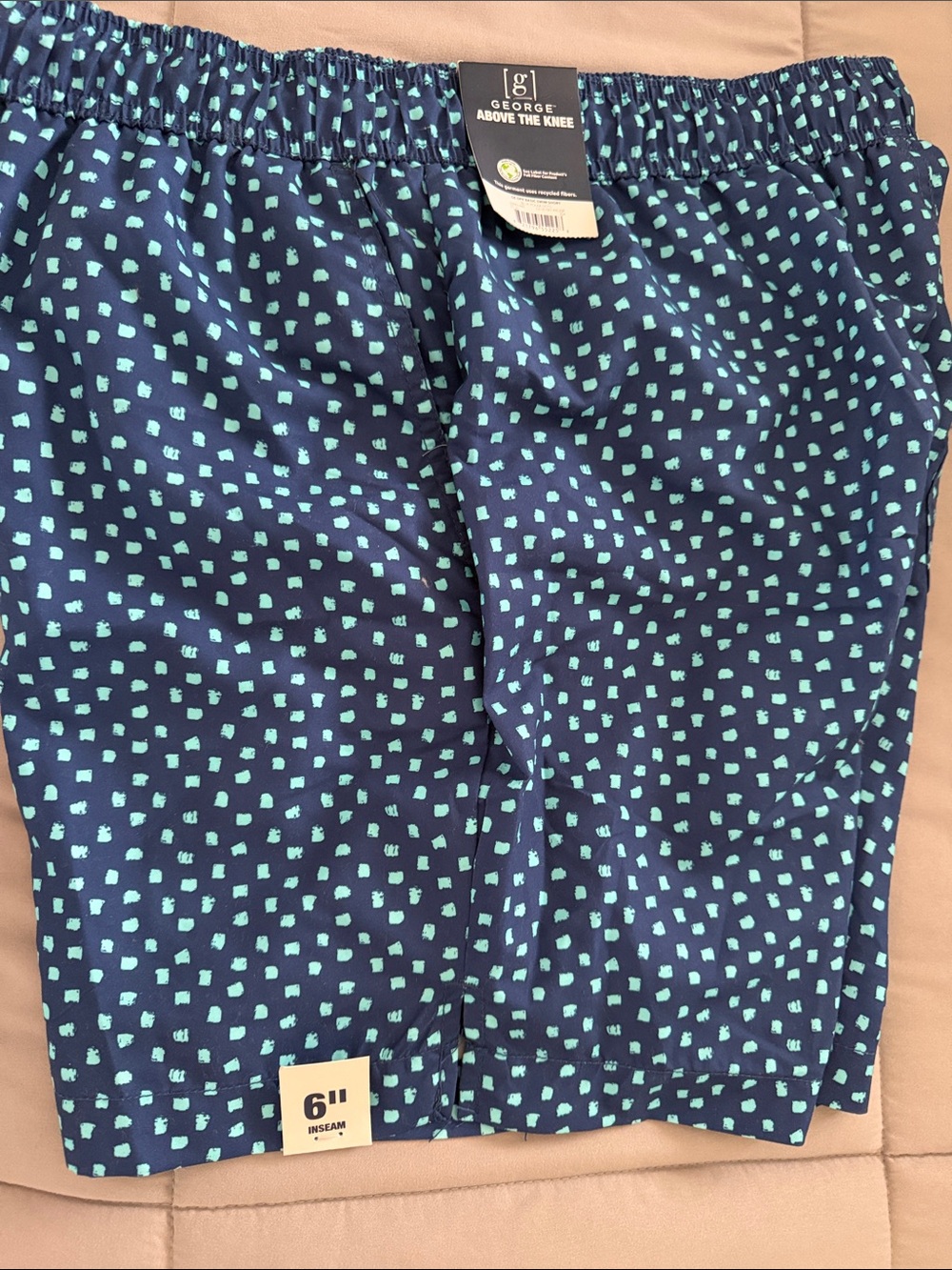 George Navy Blue Shorts with Aqua Dot Print
New with tags mesh lining